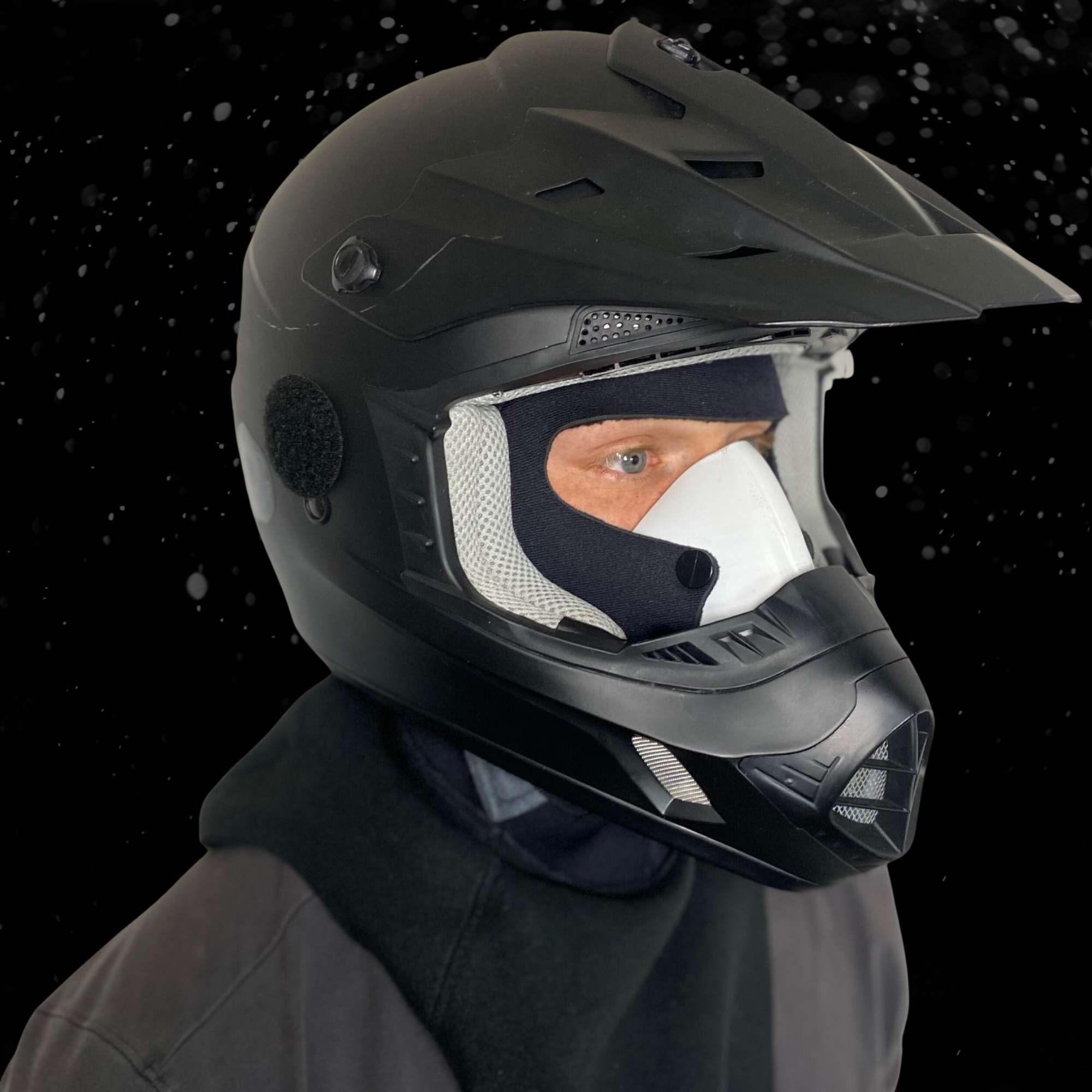 Demonstration of the gear compatibility with motocross style helmets.